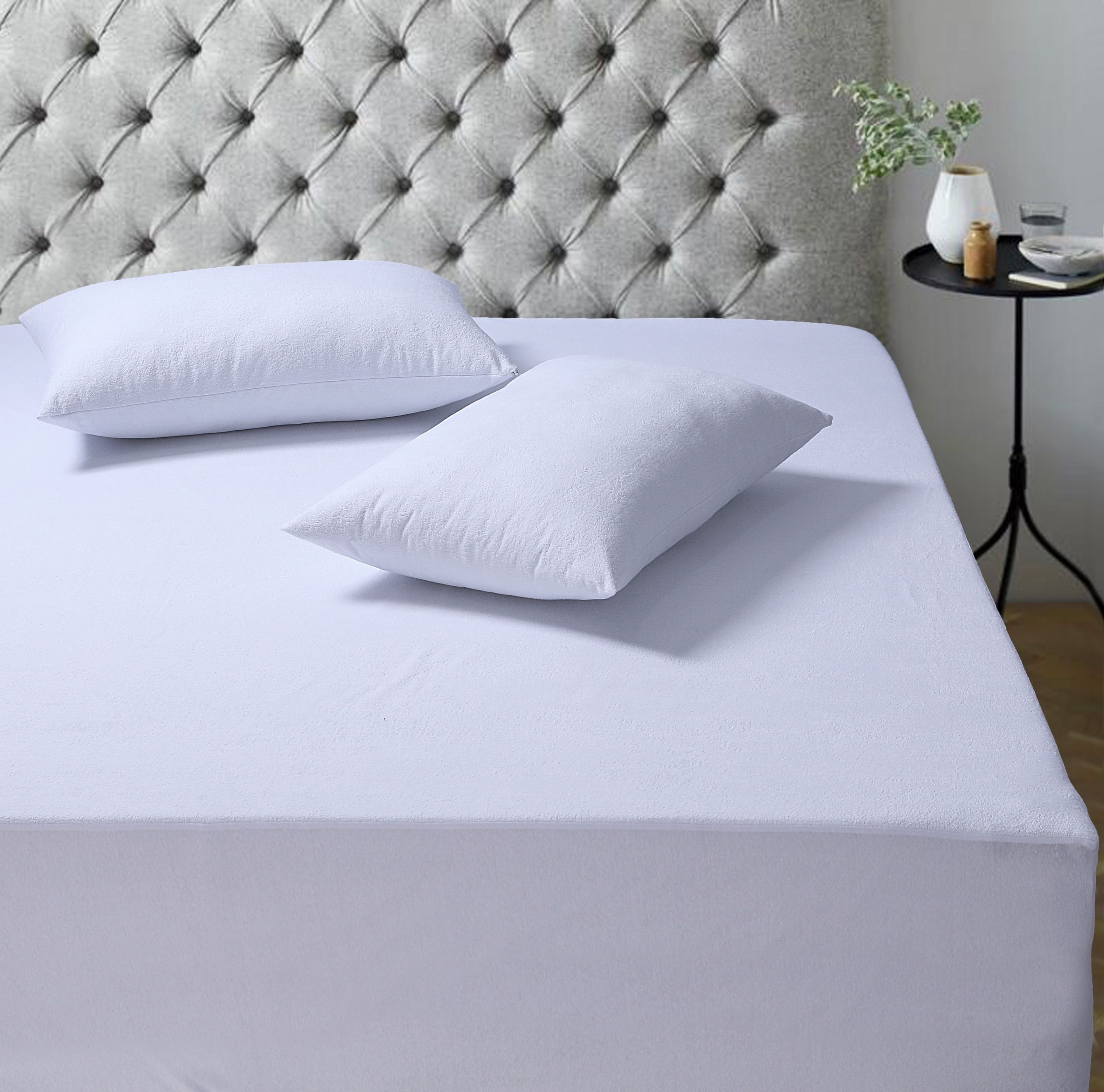 A soft, breathable 100% cotton mattress protector designed for comfort and protection, featuring a deep stretchable pocket for a perfect fit.