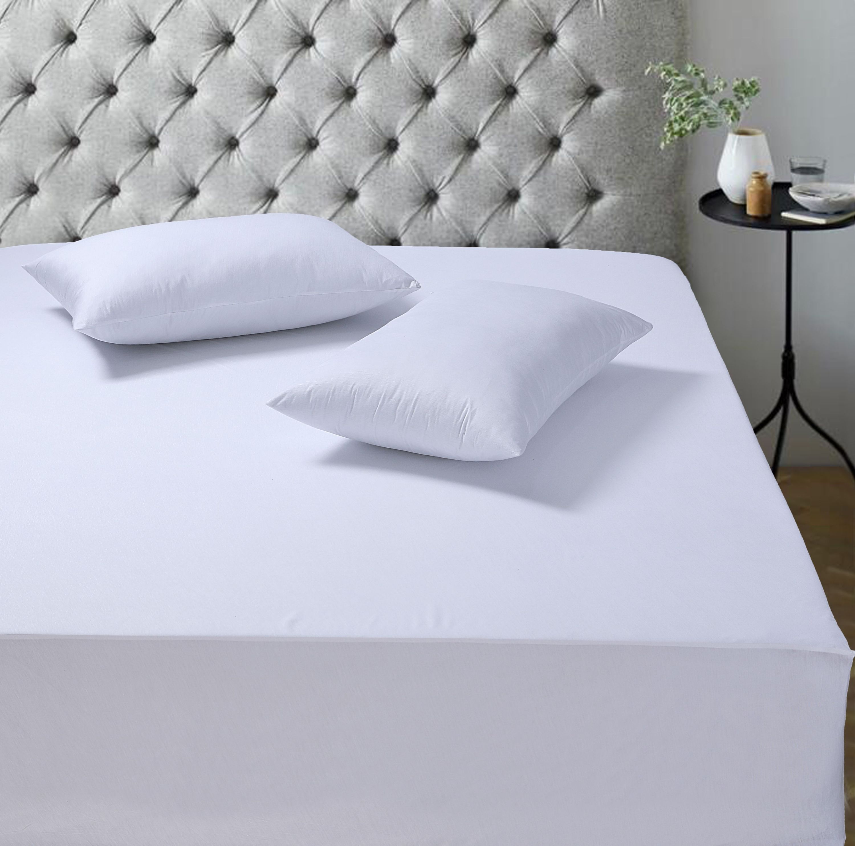 A soft, breathable 100% cotton mattress protector designed for comfort and protection, featuring a deep stretchable pocket for a perfect fit.