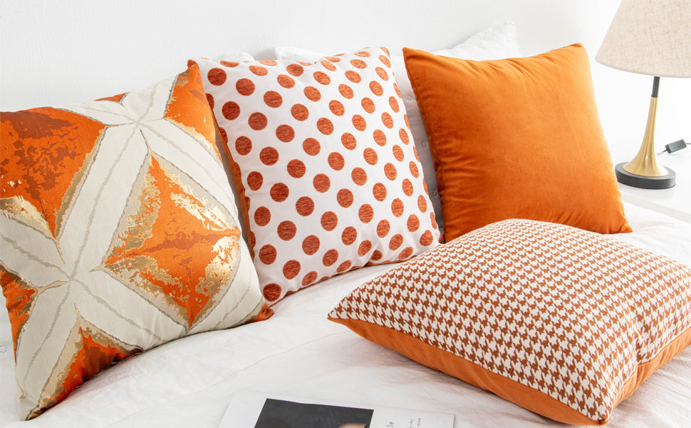 Multiple geometric pattern orange cushion cover, 45cm x 45cm, featuring chenille and velvet materials.