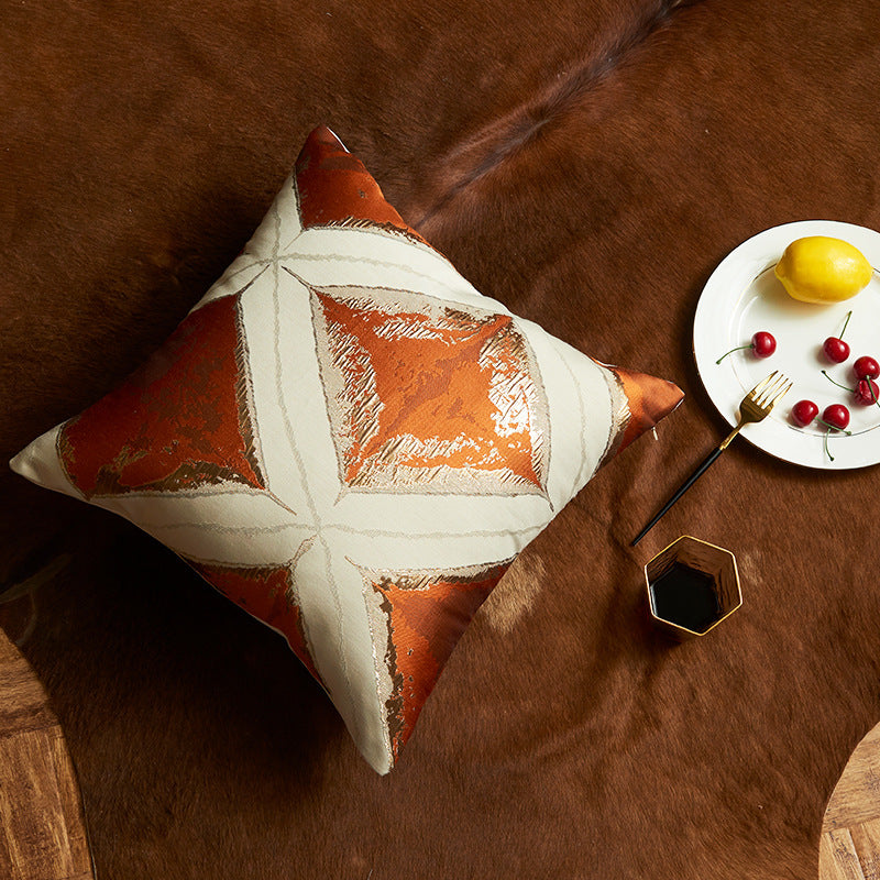 Multiple geometric pattern orange cushion cover, 45cm x 45cm, featuring chenille and velvet materials.