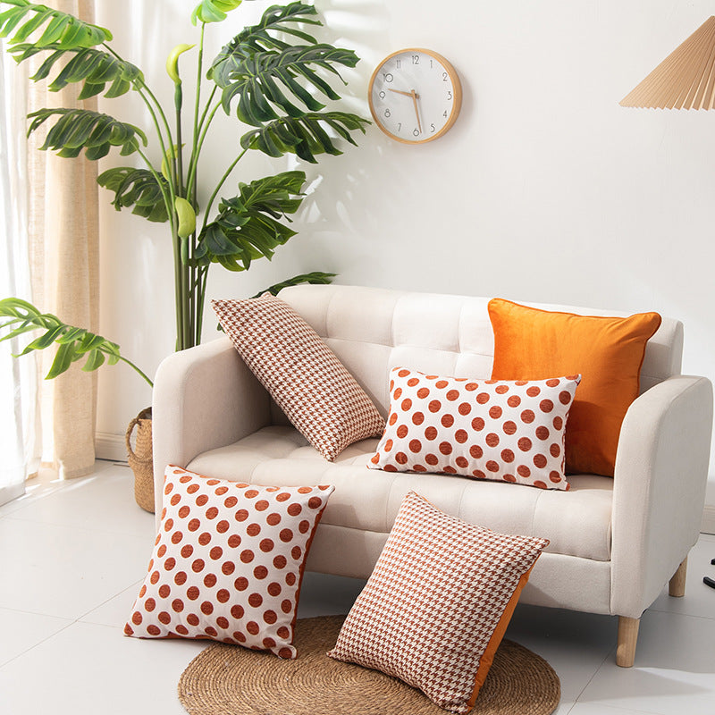 Multiple geometric pattern orange cushion cover, 45cm x 45cm, featuring chenille and velvet materials.