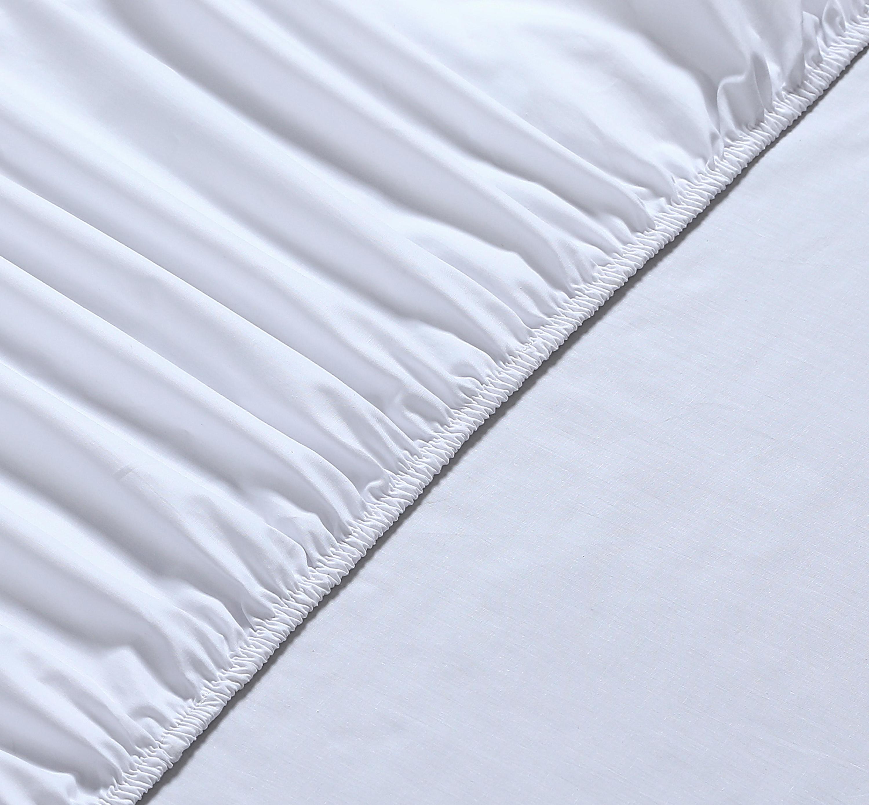 A crisp and lightweight Percale Fitted Sheet made from 100% cotton, showcasing its smooth texture and all-round elastic hem for a perfect fit.