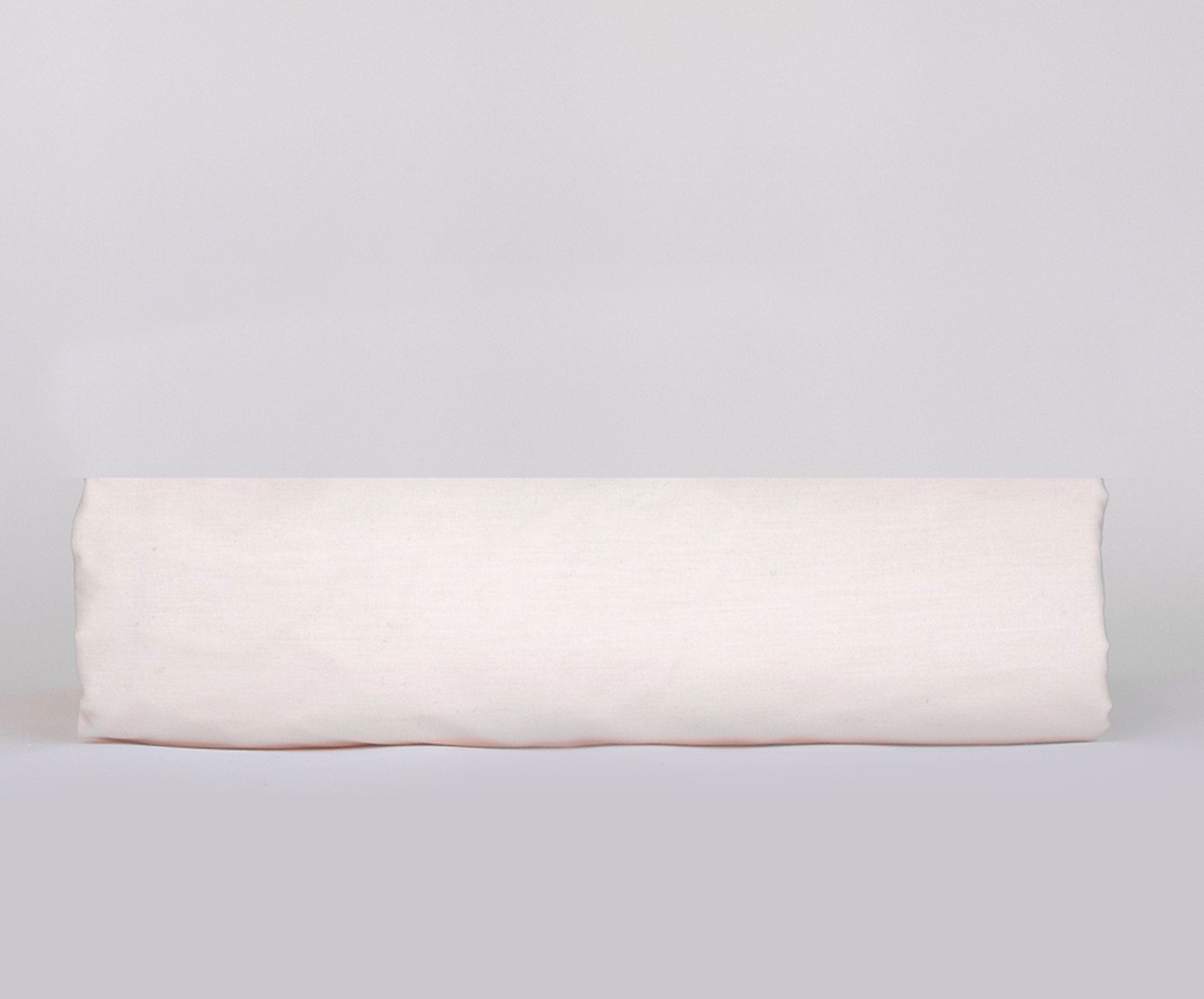 A crisp and lightweight Percale Fitted Sheet made from 100% cotton, showcasing its smooth texture and all-round elastic hem for a perfect fit.