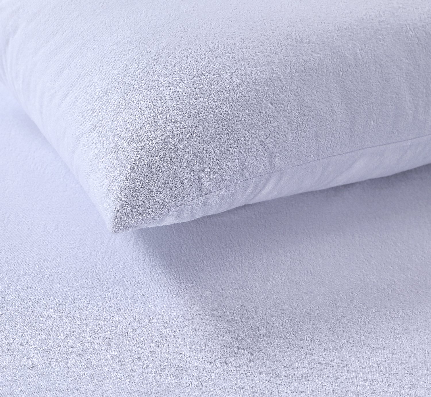 A set of soft, breathable pillow protectors made from 100% cotton, showcasing their water-resistant and allergen-friendly features.