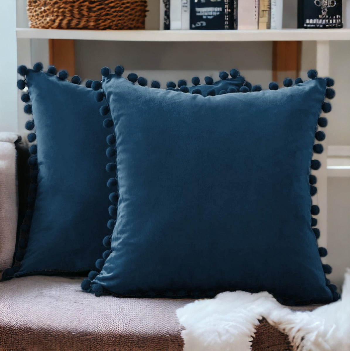 A cozy set of Plush Pom Poms pillows in soft velour material, perfect for cuddling or decorative use.