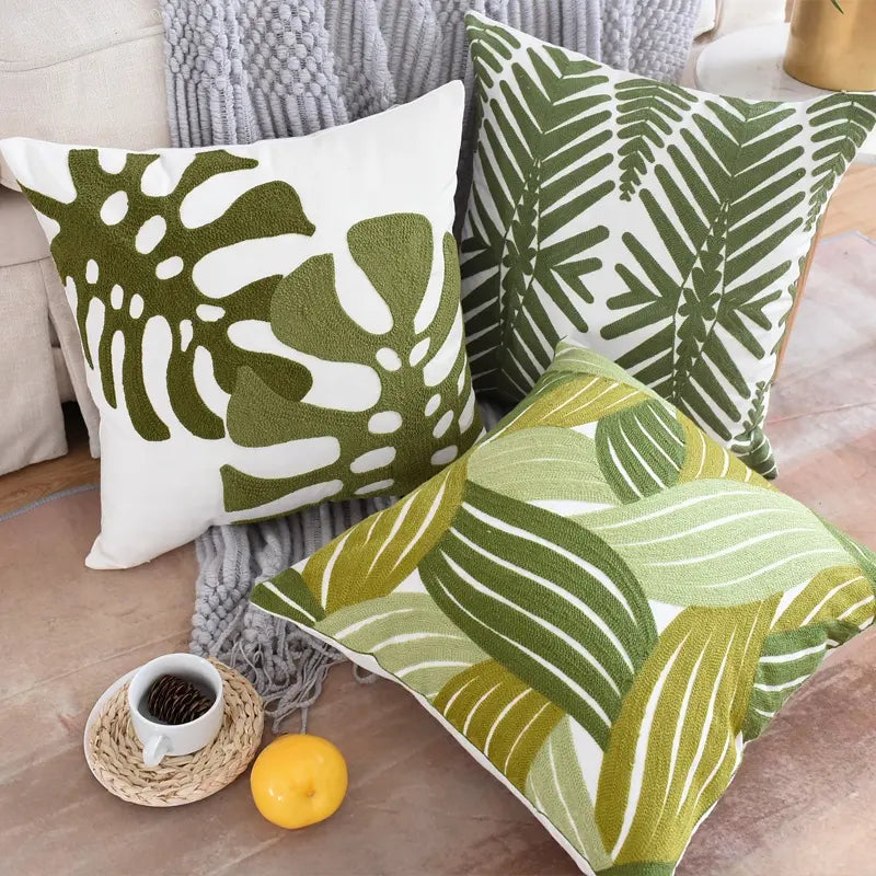 Pure cotton cushion cover featuring an elegant green leaves embroidery pattern, measuring 45x45cm, perfect for home decor.