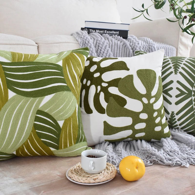 Pure cotton cushion cover featuring an elegant green leaves embroidery pattern, measuring 45x45cm, perfect for home decor.