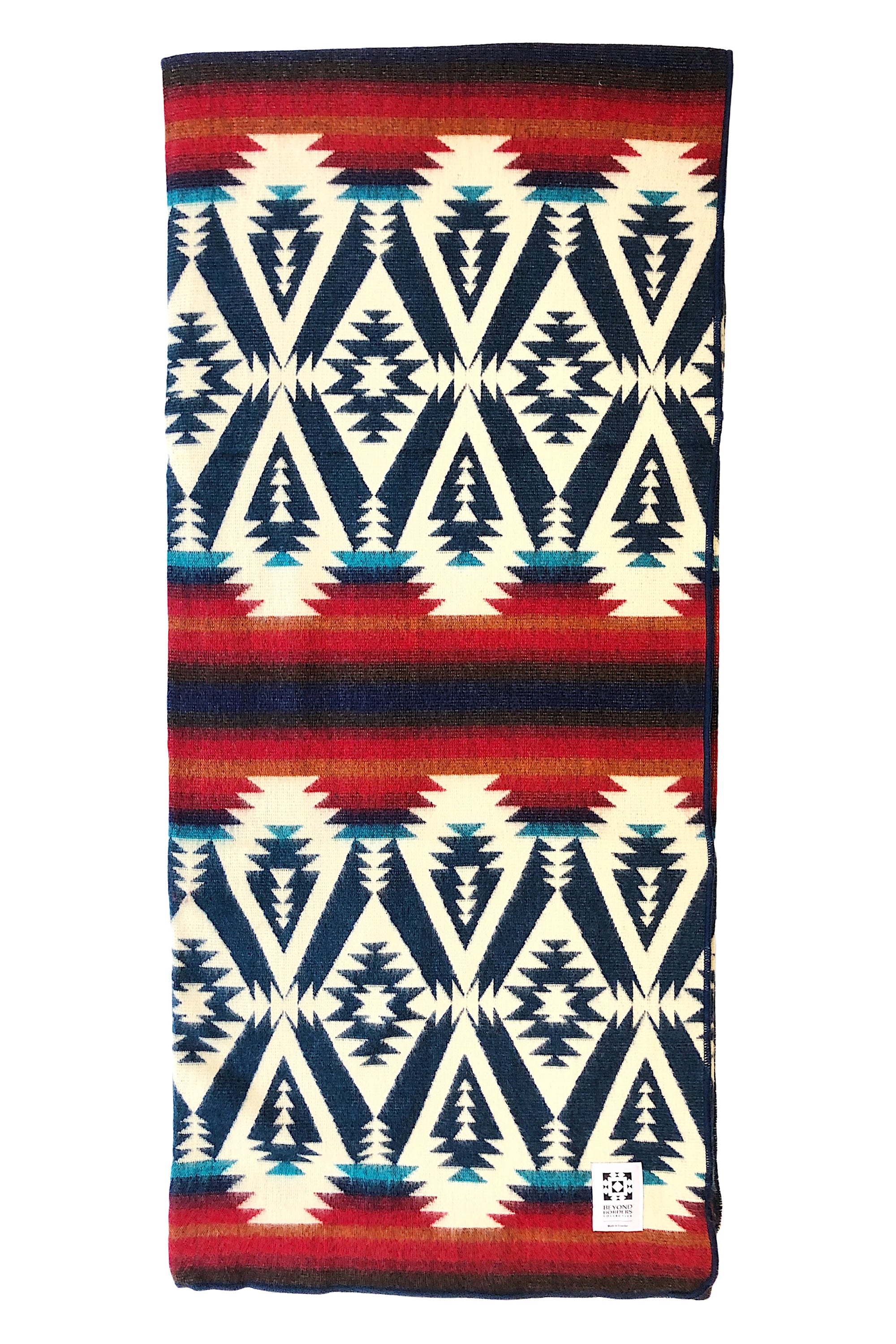 Quichua Blanket featuring vibrant colors and intricate patterns, handcrafted by Ecuadorian artisans, perfect for outdoor and indoor use.