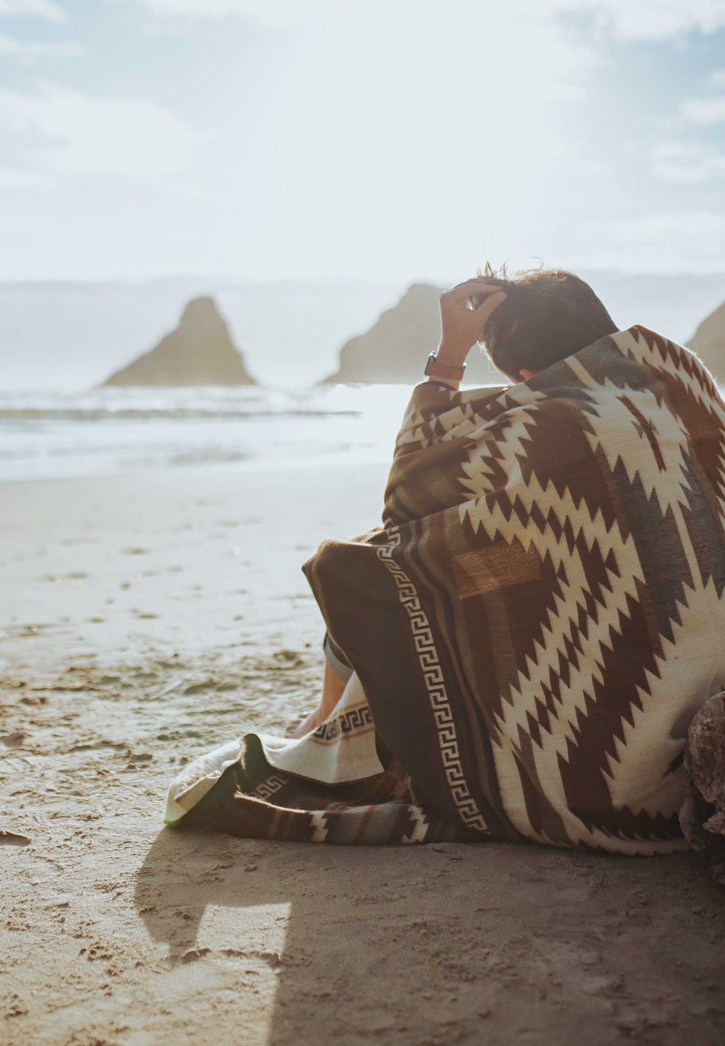 Shuar Blanket - Dusty, featuring vibrant colors and intricate patterns, handcrafted by Ecuadorian artisans, perfect for cozying up or outdoor use.