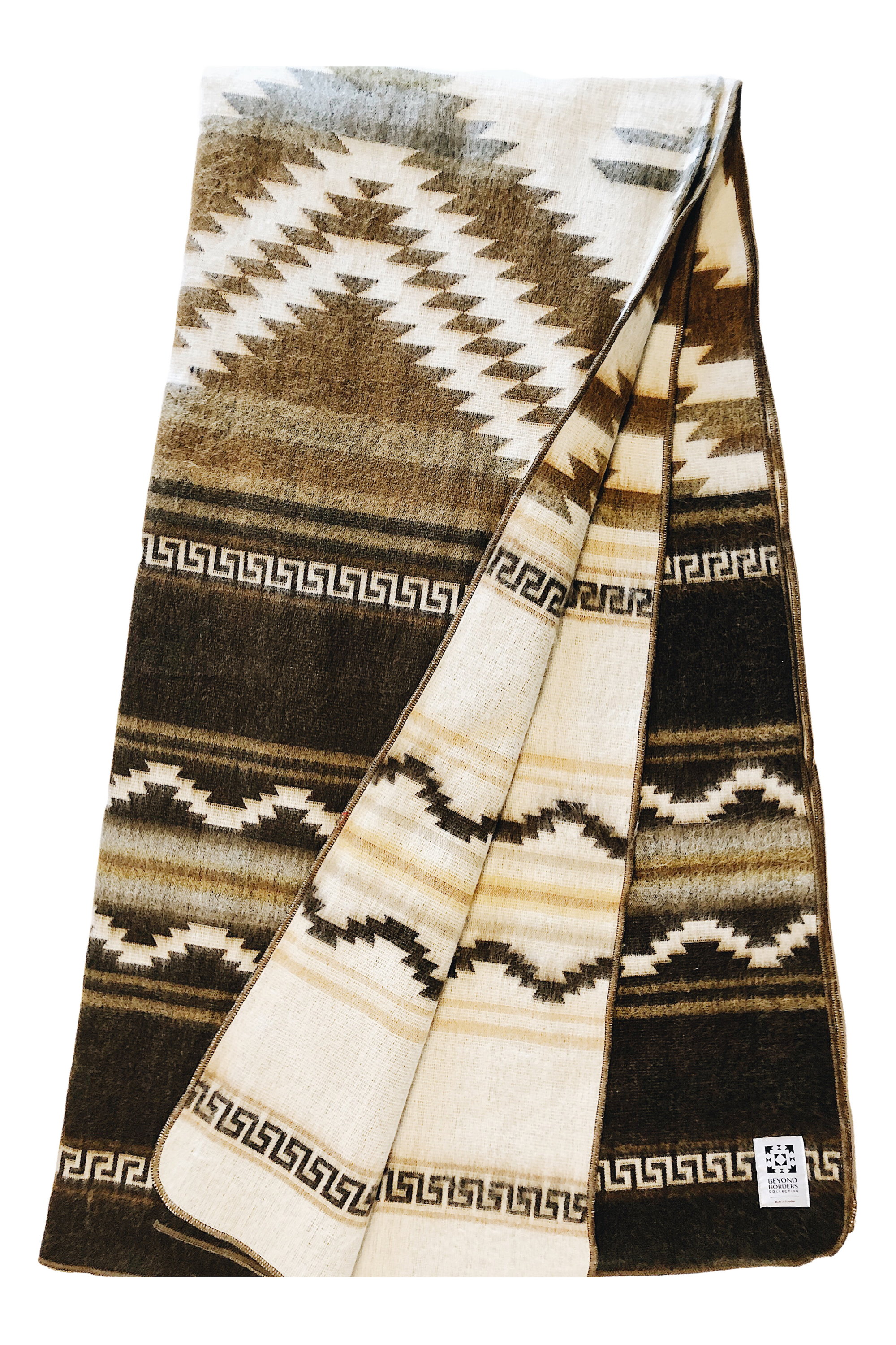 Shuar Blanket - Dusty, featuring vibrant colors and intricate patterns, handcrafted by Ecuadorian artisans, perfect for cozying up or outdoor use.