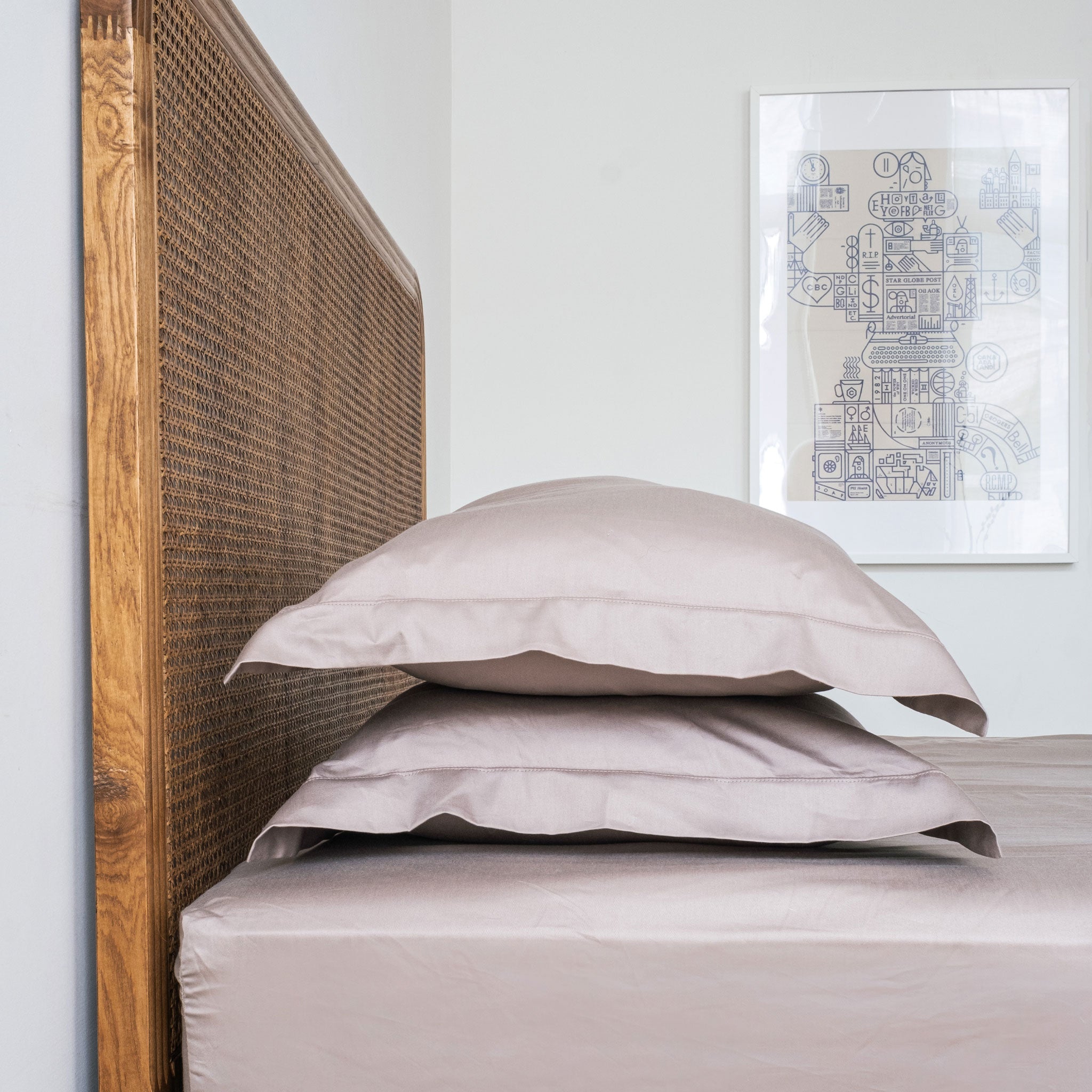 A luxurious set of Silky Satin Pillowcases made from 100% long-pile cotton, showcasing their smooth texture and elegant design.