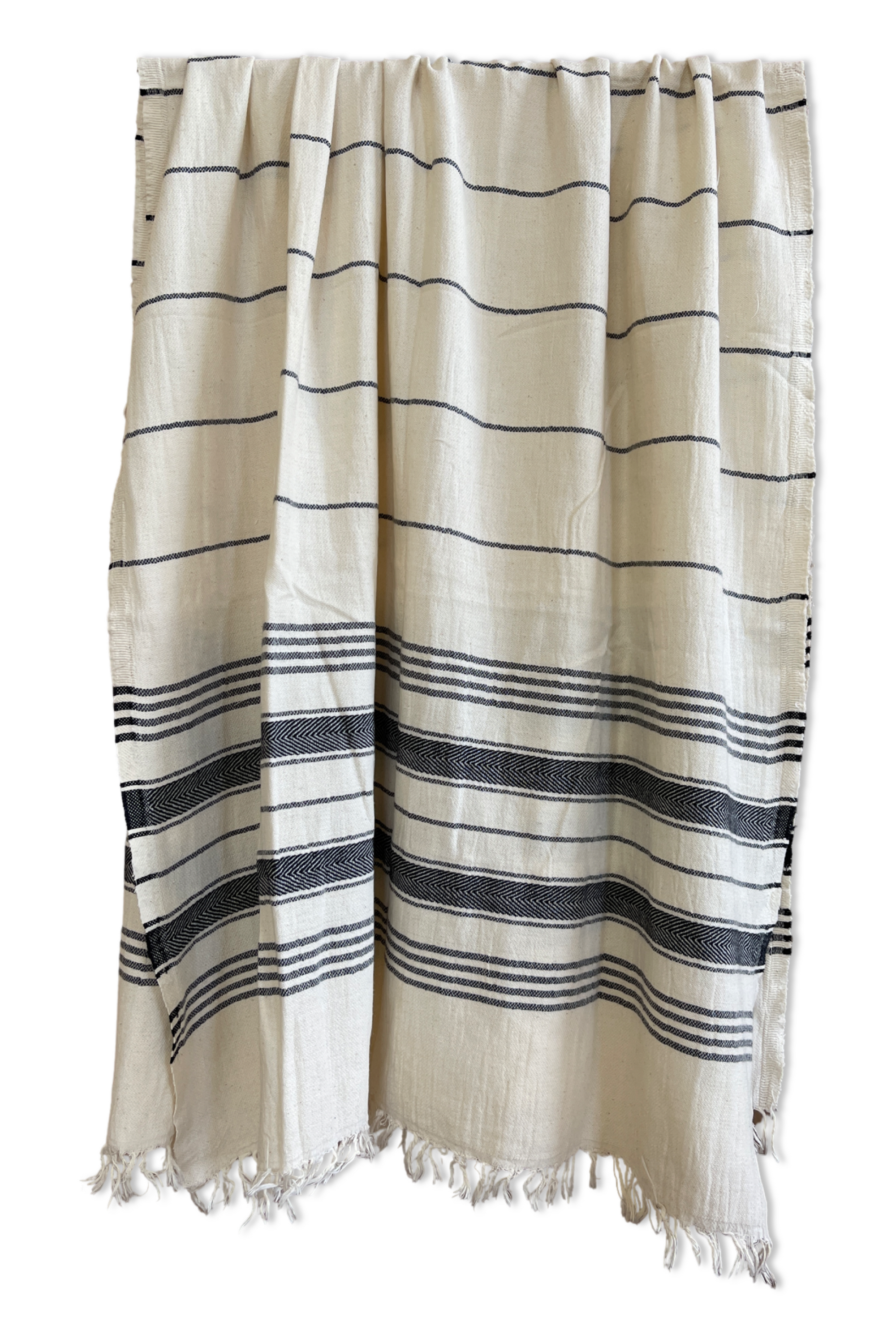 Su Turkish Cotton Towel in natural and black colors, showcasing its soft texture and elegant design, perfect for beach and home use.