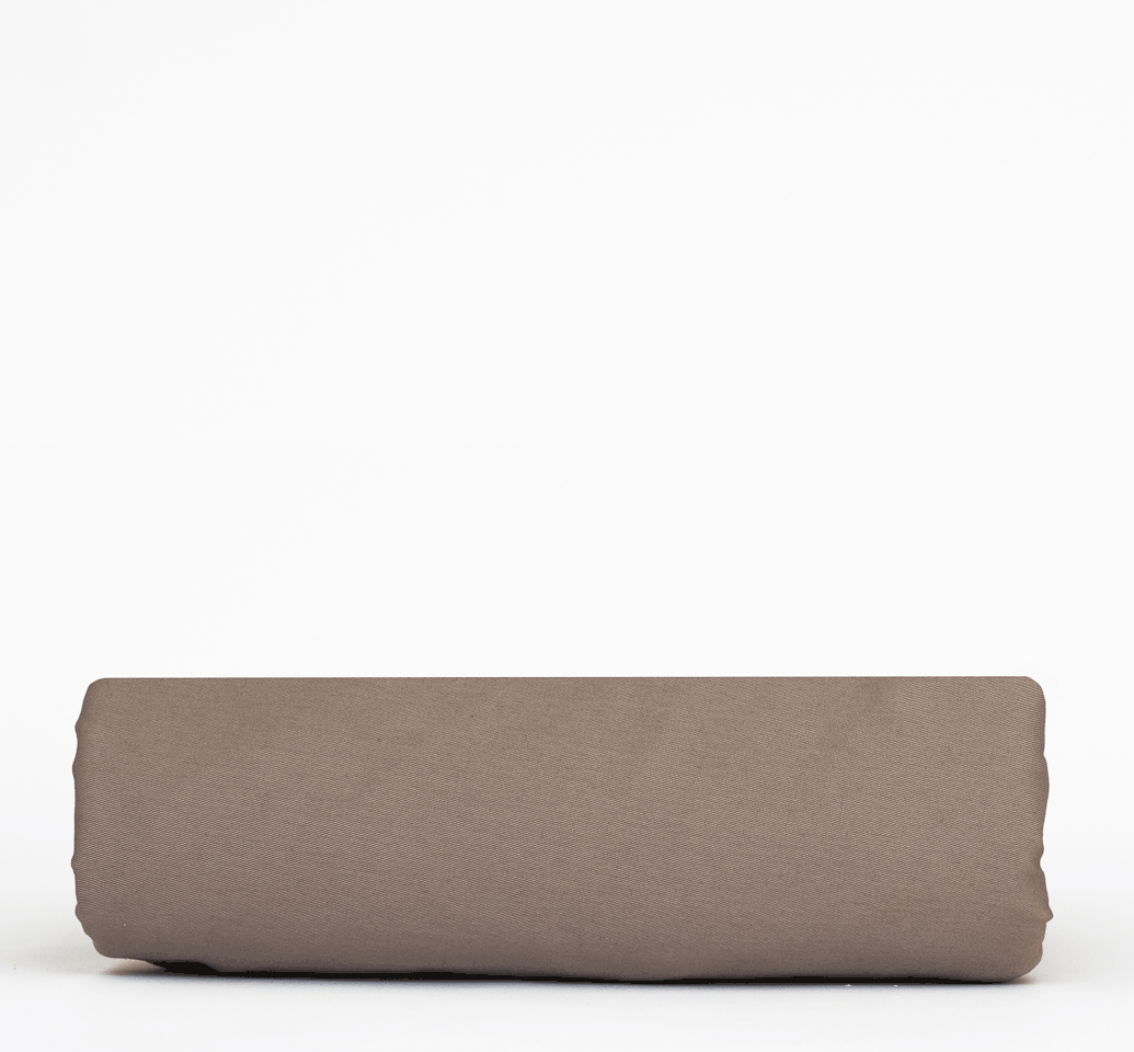 A Twill Fitted Sheet showcasing its durable twill weave and non-slip rubber backing, available in various colors.