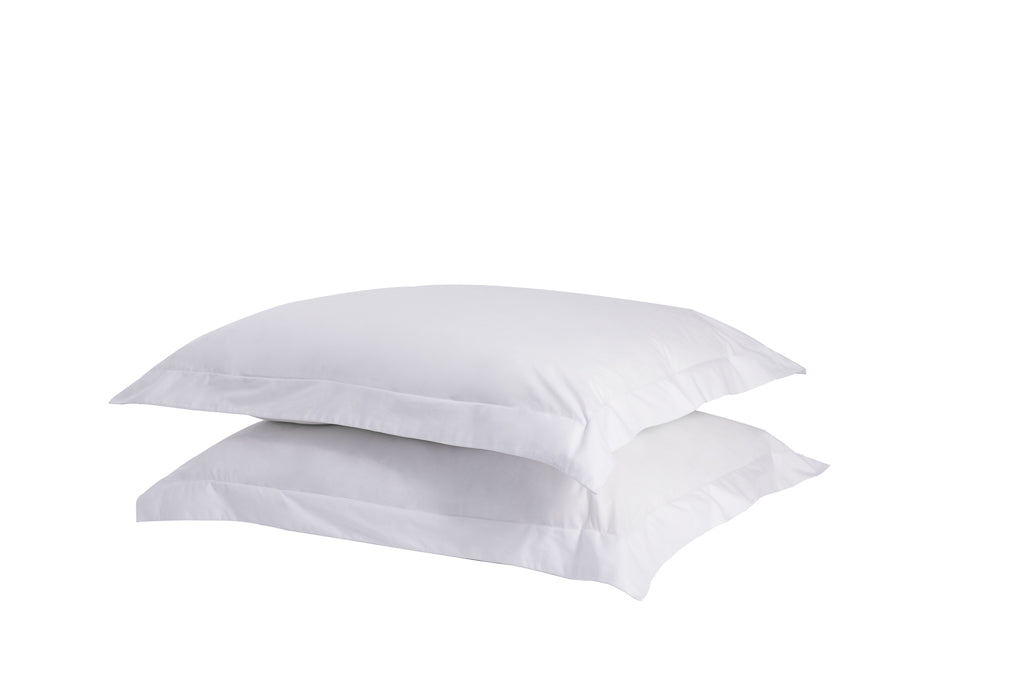 A set of two twill weave cotton pillowcases in various colors, showcasing their soft texture and durability.