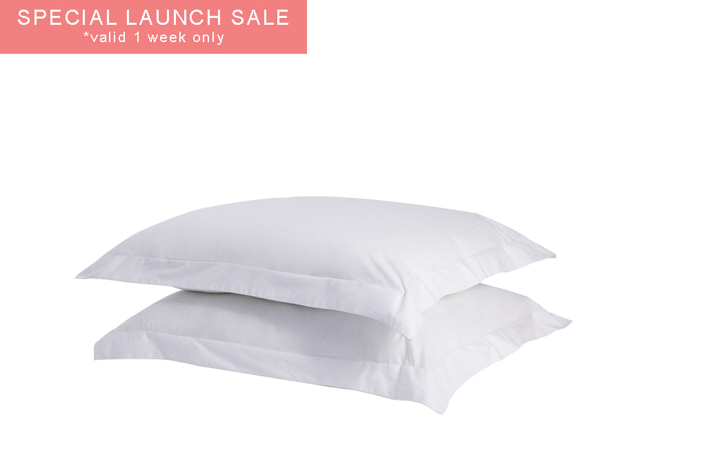 A set of two twill weave cotton pillowcases in various colors, showcasing their soft texture and durability.