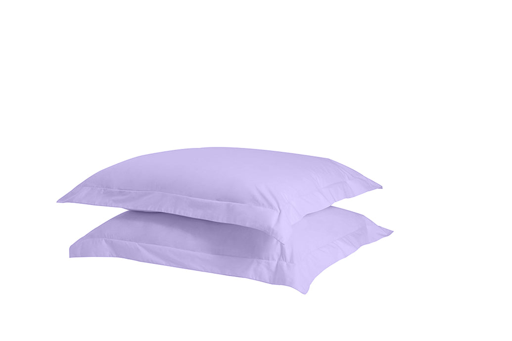 A set of two twill weave cotton pillowcases in various colors, showcasing their soft texture and durability.