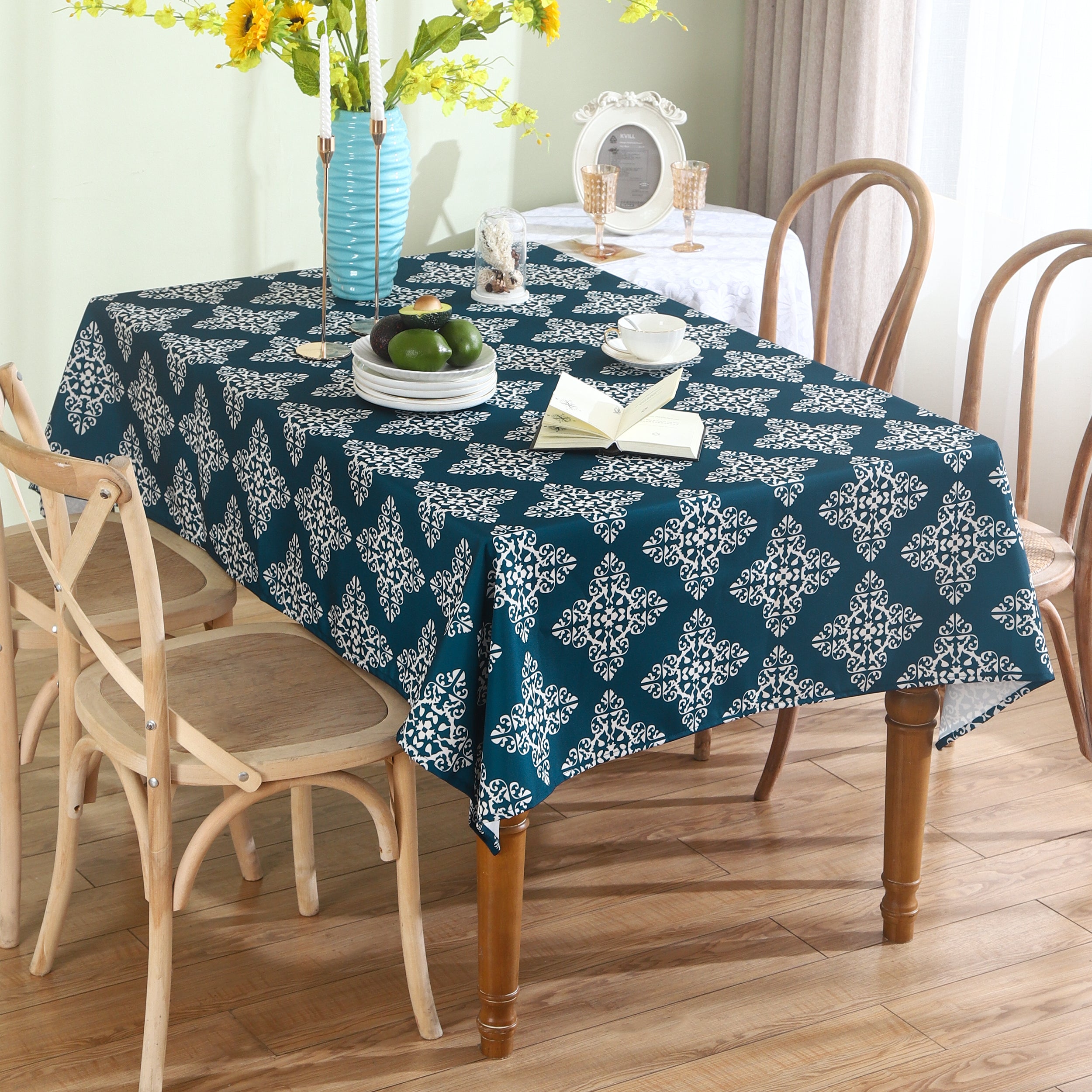 Water resistant blue table cloth with geometric design, suitable for indoor and outdoor use, measuring 137x185 CM.