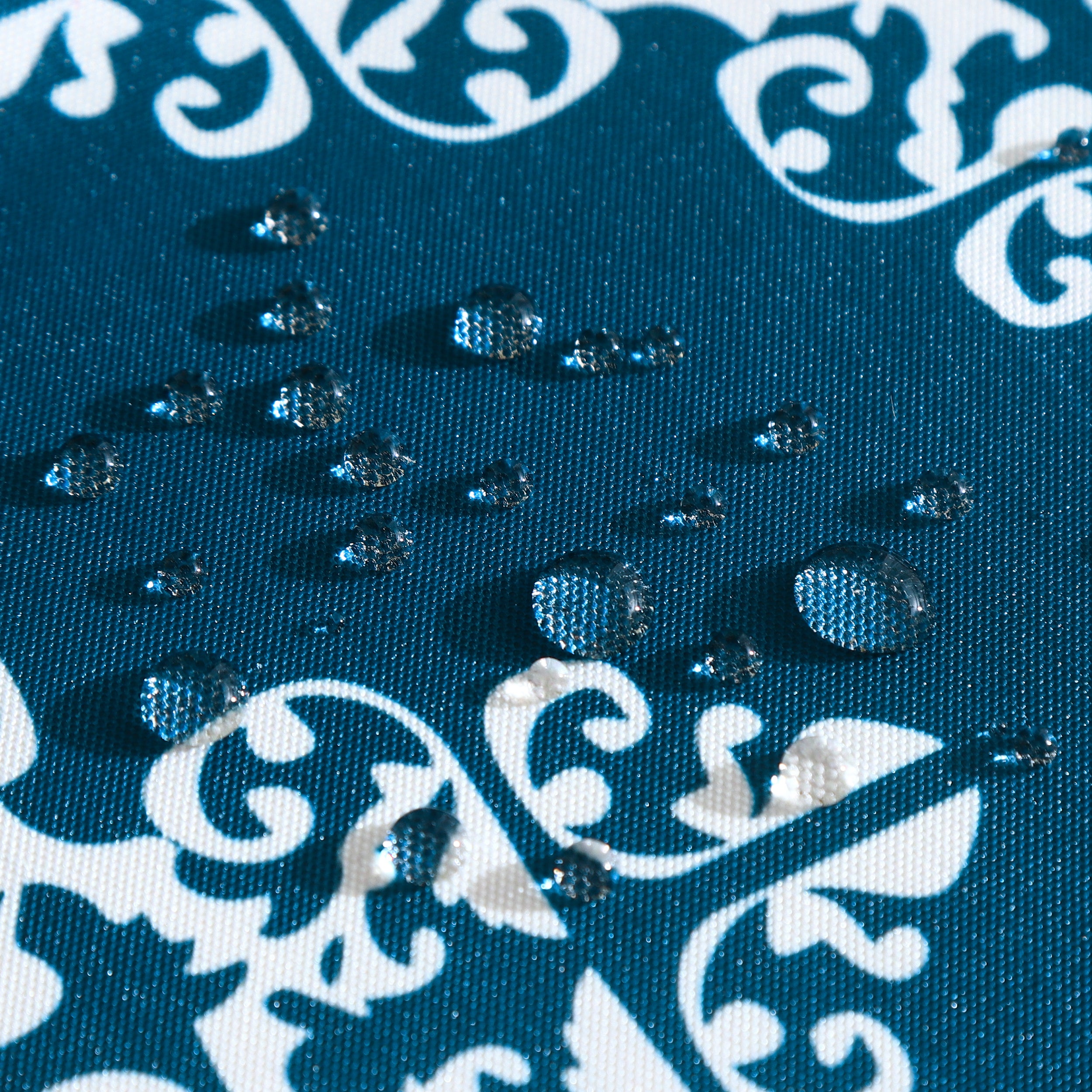 Water resistant blue table cloth with geometric design, suitable for indoor and outdoor use, measuring 137x185 CM.