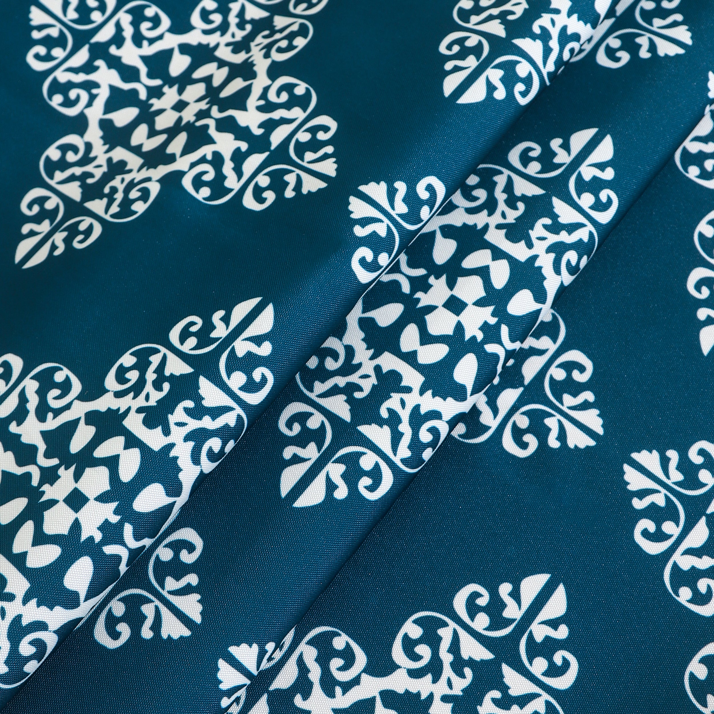 Water resistant blue table cloth with geometric design, suitable for indoor and outdoor use, measuring 137x185 CM.