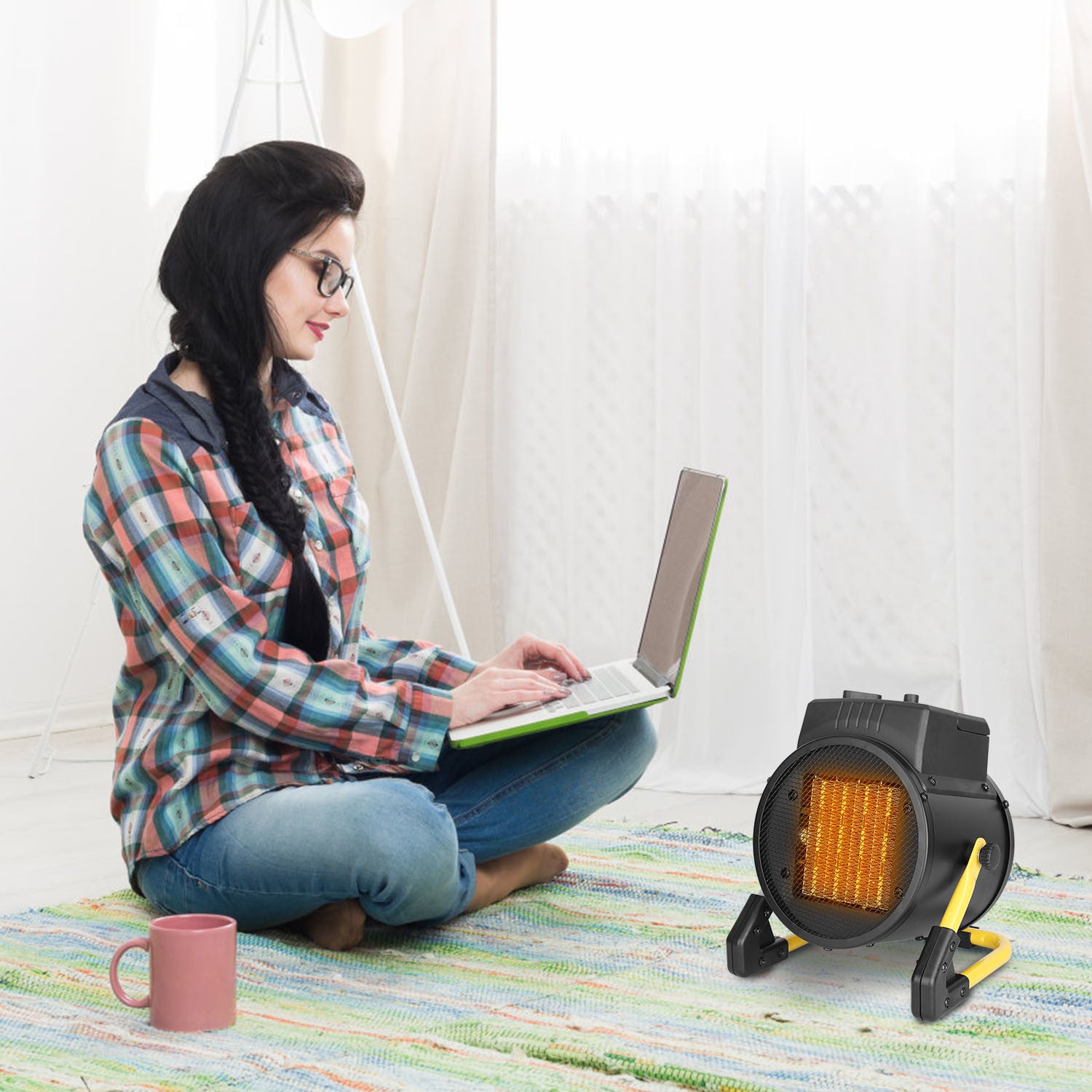 1500W Portable Electric Space Heater in black, featuring adjustable modes and a compact design for personal use.