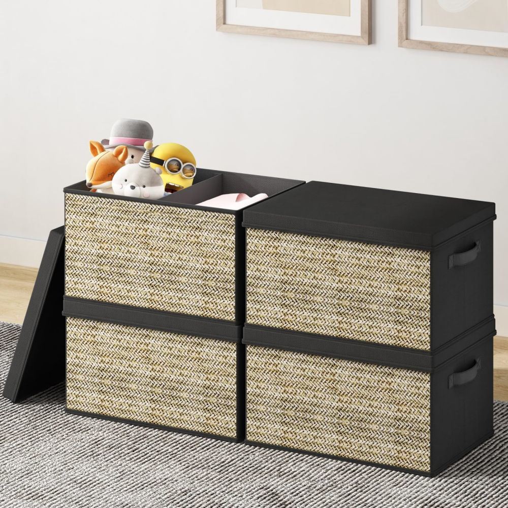 Set of four foldable fabric storage boxes with handles, ideal for organizing various items in stylish design.