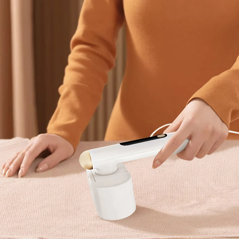 Rechargeable double head lint remover for clothes, featuring dual heads and a sleek design, ideal for removing lint and hairballs from various fabrics.