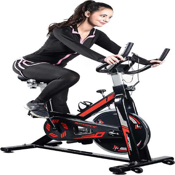 Exercise stationary bike with a 330 lbs weight capacity, featuring adjustable seat and handlebars, digital monitor, and transportation wheels for easy mobility.