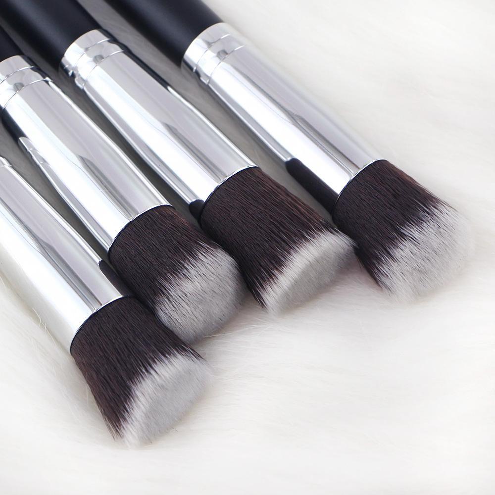 Mini Makeup Brushes Set for Travel featuring 10 professional brushes in a chic black design with golden accents and wooden handles.