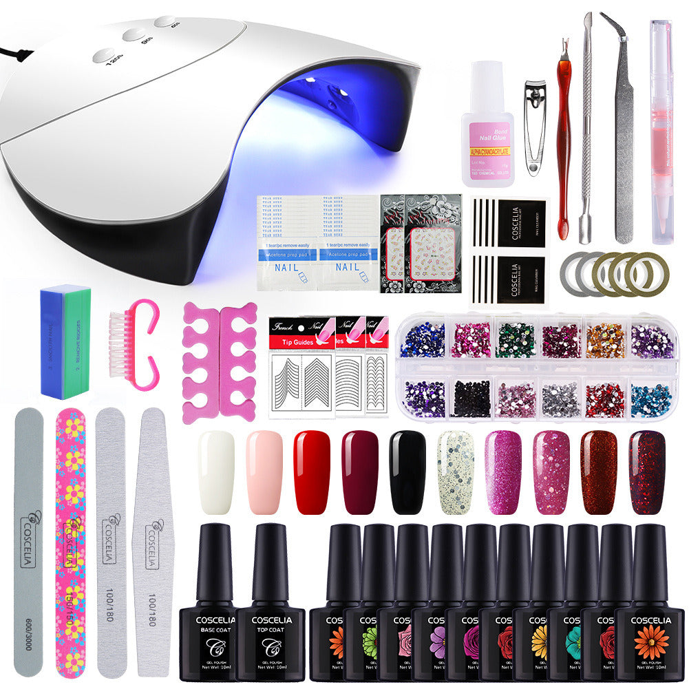 A collection of nail kit tools including vibrant UV gel colors and a USB-powered LED lamp for nail art.