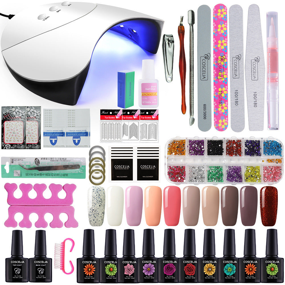 A collection of nail kit tools including vibrant UV gel colors and a USB-powered LED lamp for nail art.