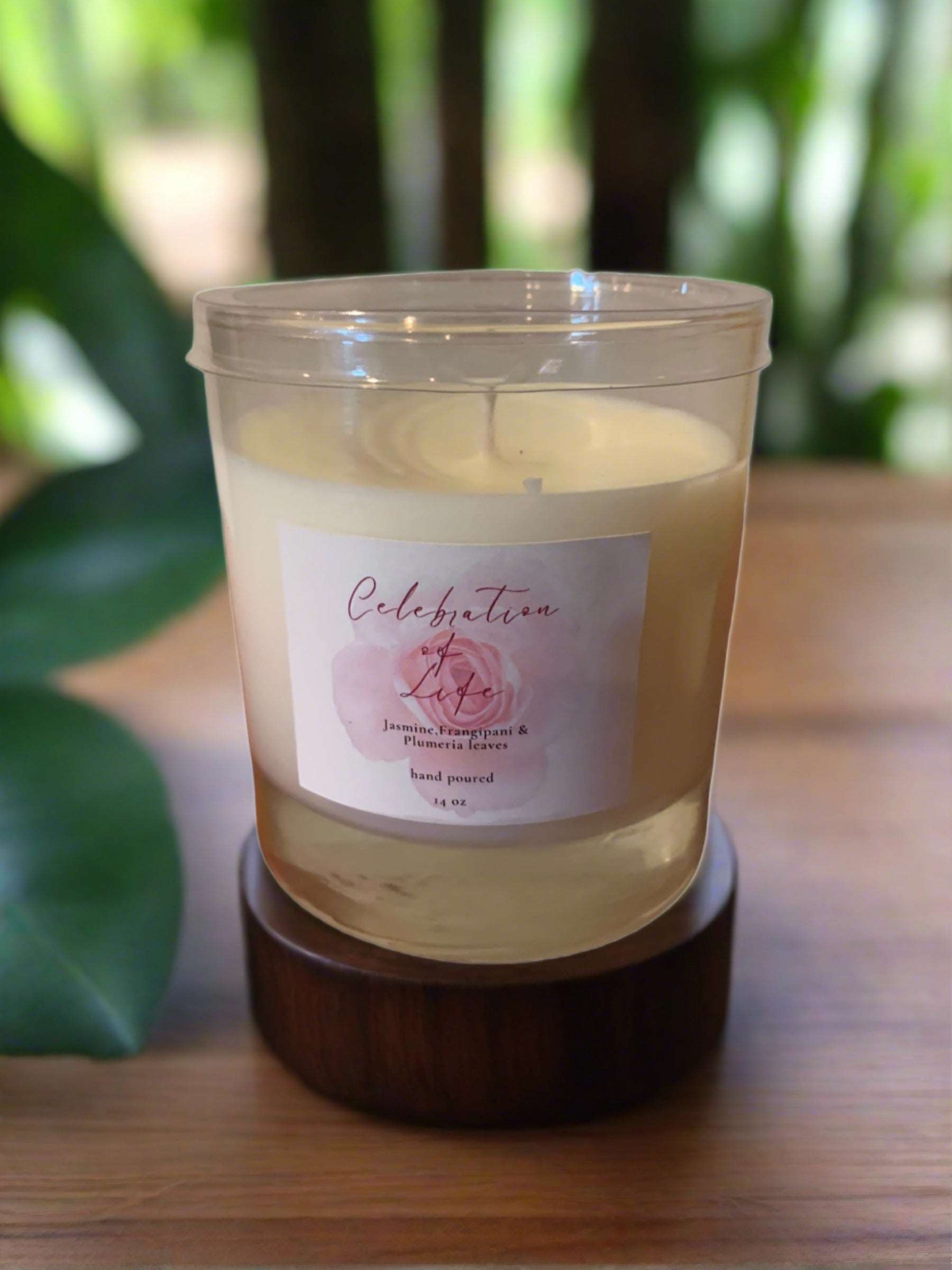 An elegant 11 oz Celebration of Life Soy Blend Candle, showcasing a sleek design and warm glow, perfect for home decor.