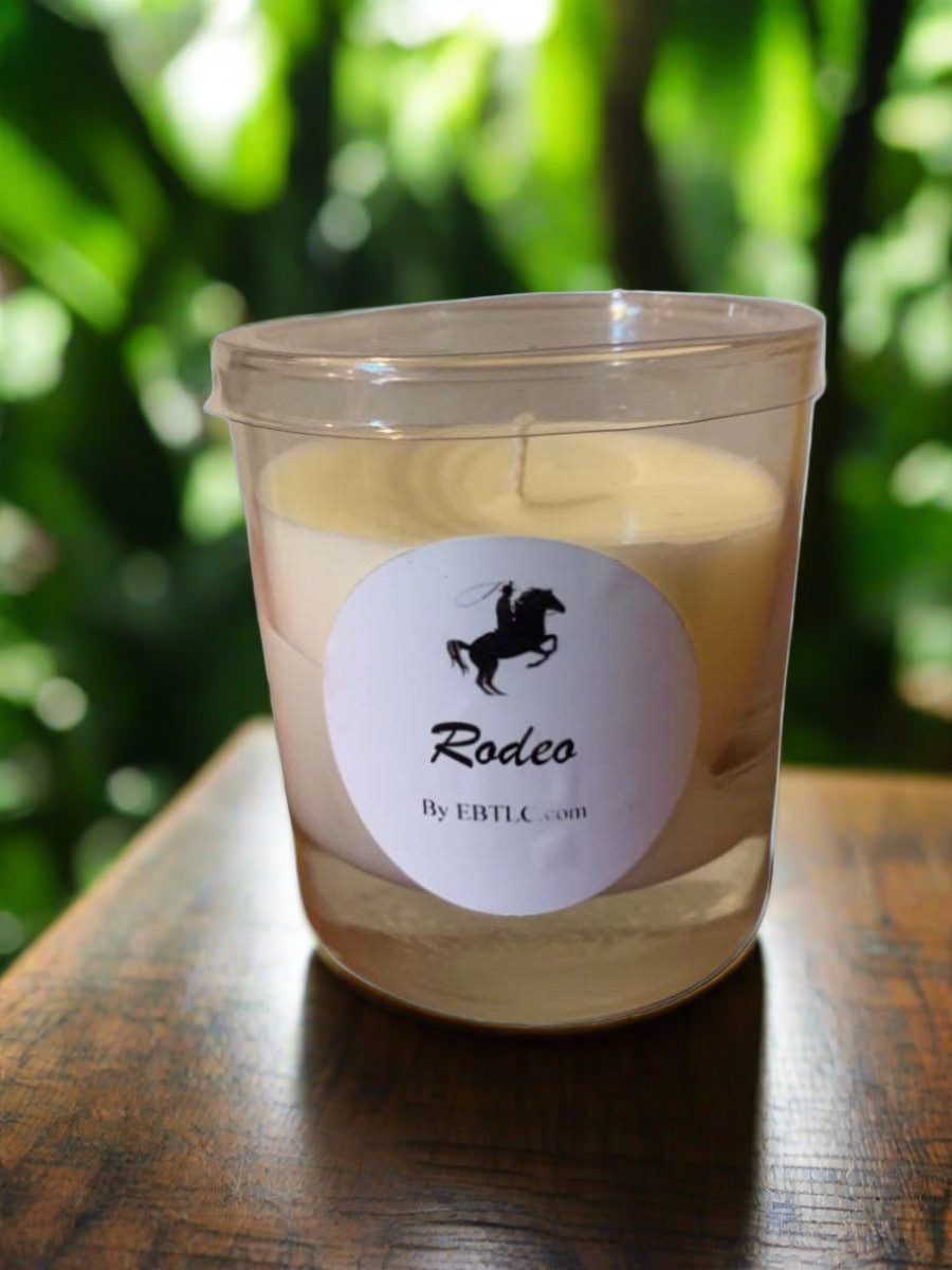 11 oz Rodeo Fragrance Soy Blend Candle in a stylish glass container, showcasing its warm glow and inviting scent.