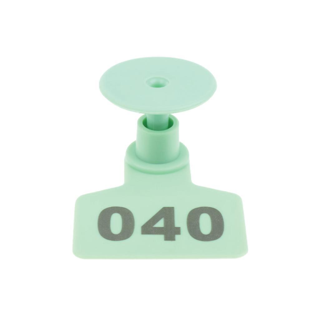 A set of medium green cattle ear tags numbered from 001 to 100, designed for easy identification of livestock.