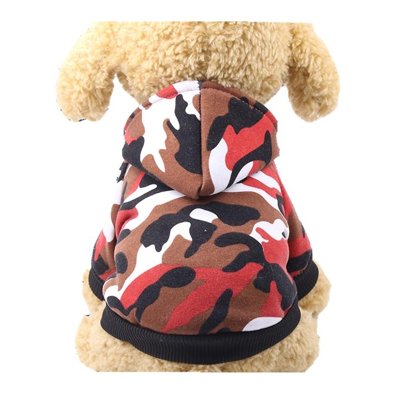 A stylish 100% cotton dog jacket in vibrant colors, perfect for autumn and winter wear, featuring a cozy hoodie design.