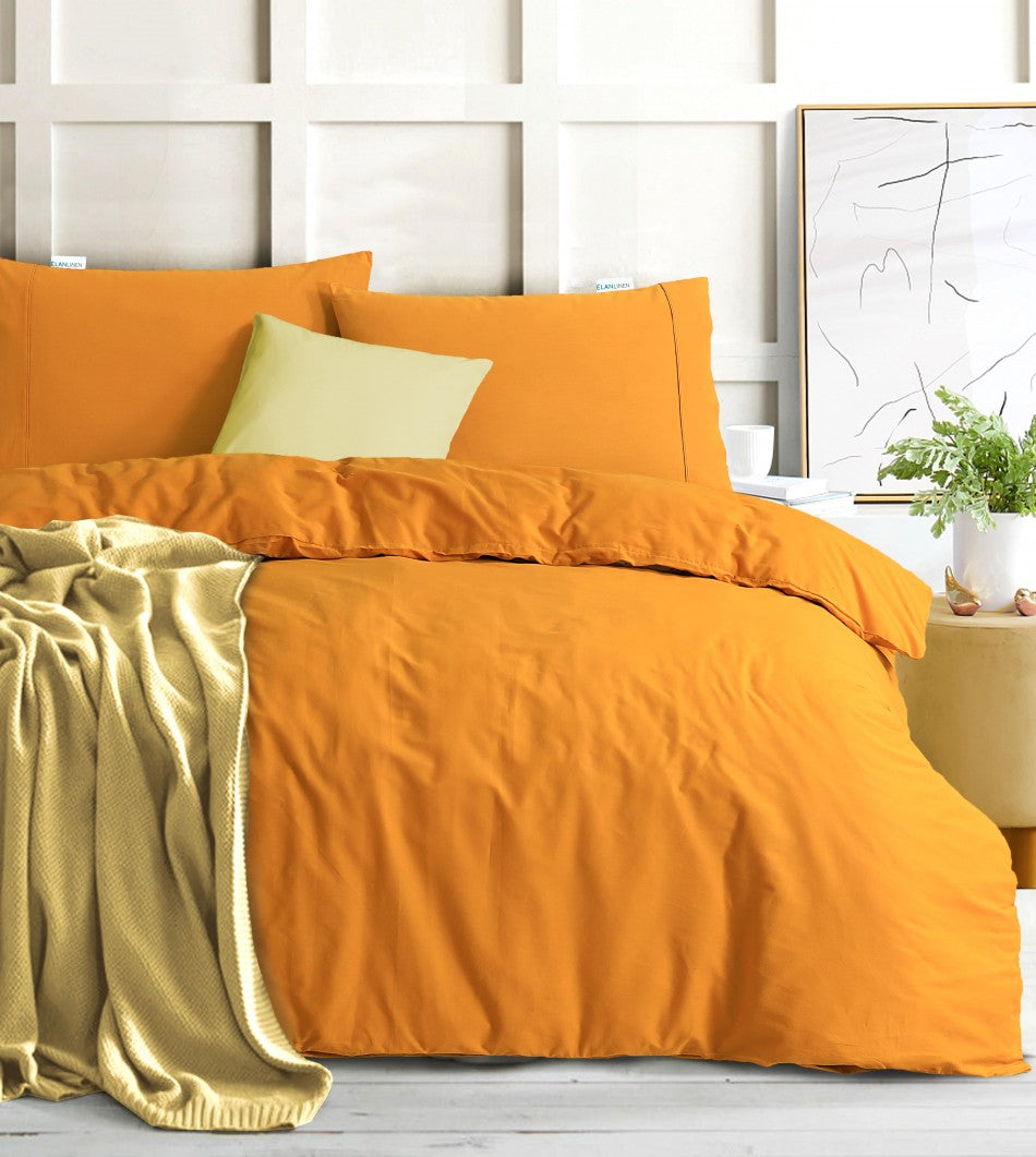 100% Egyptian Cotton Vintage Washed 500TC Mustard Queen Quilt Cover with matching pillowcases, showcasing a soft and luxurious texture.