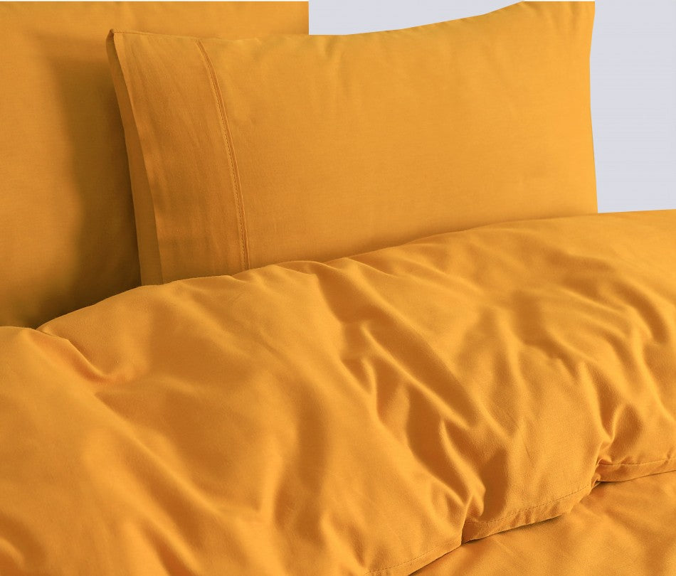 100% Egyptian Cotton Vintage Washed 500TC Mustard Queen Quilt Cover with matching pillowcases, showcasing a soft and luxurious texture.