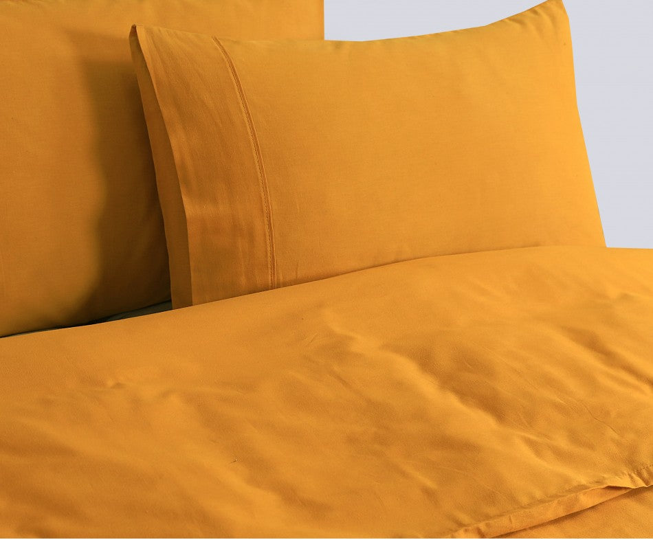 100% Egyptian Cotton Vintage Washed 500TC Mustard Queen Quilt Cover with matching pillowcases, showcasing a soft and luxurious texture.