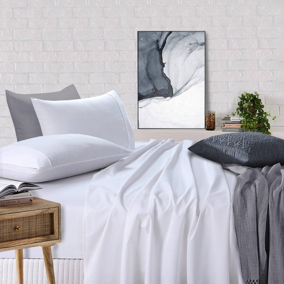 100% Egyptian Cotton Vintage Washed 500TC White Double Bed Sheets Set displayed on a bed, showcasing its luxurious texture and elegant design.