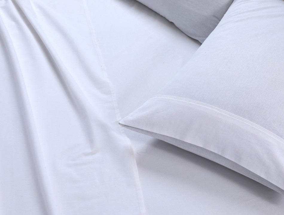 100% Egyptian Cotton Vintage Washed 500TC White Double Bed Sheets Set displayed on a bed, showcasing its luxurious texture and elegant design.