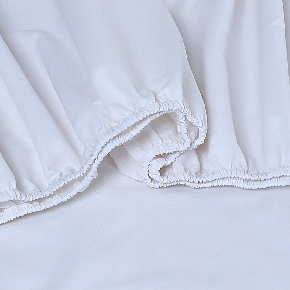 100% Egyptian Cotton Vintage Washed 500TC White Double Bed Sheets Set displayed on a bed, showcasing its luxurious texture and elegant design.