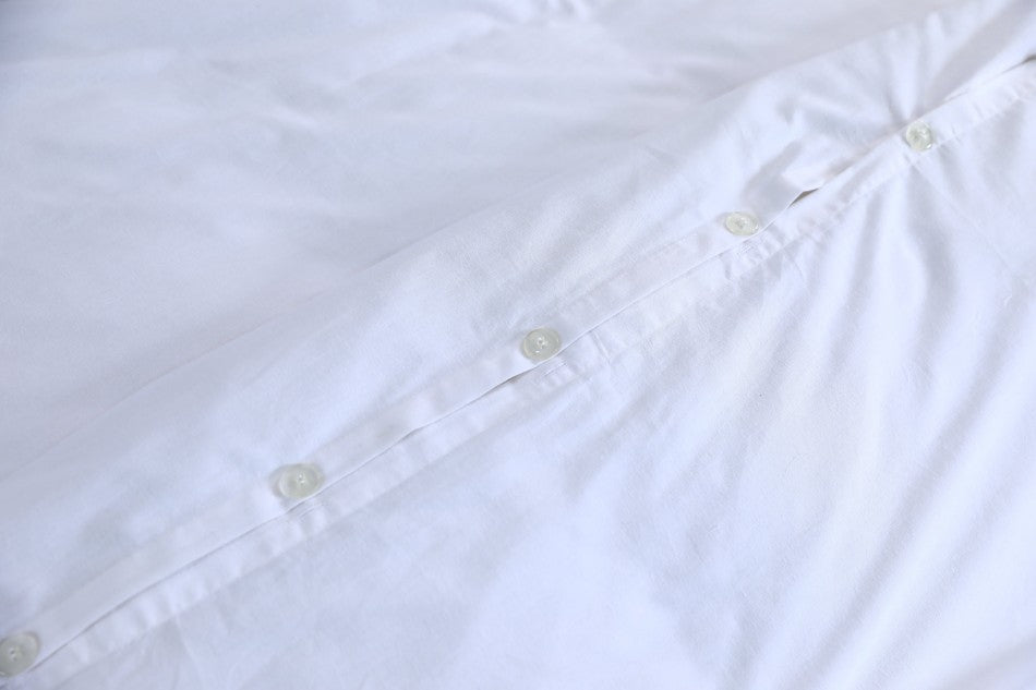 100% Egyptian Cotton Vintage Washed 500TC White Queen Quilt Cover Set featuring a soft, luxurious texture and elegant piped hem detailing on pillowcases.