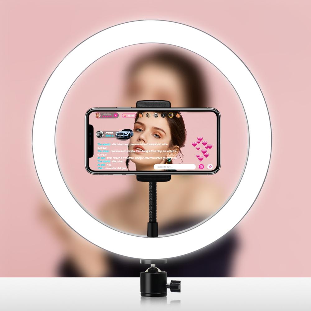 10 inch LED ring light with adjustable brightness and phone holder for iPhone and Android devices, perfect for photography and video.