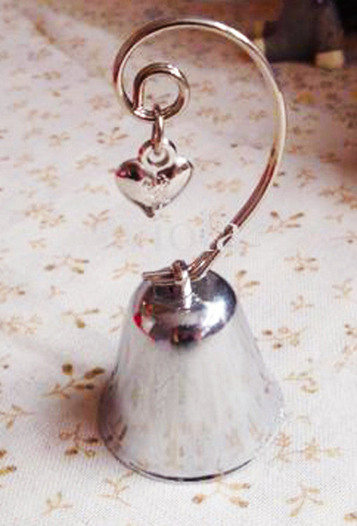 A set of 10 silver wedding kissing bells with heart name card holders, elegantly designed for table decorations.