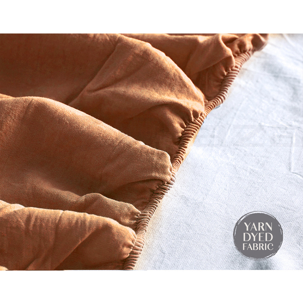 100% washed cotton sheet set in orange brown, featuring a soft texture and lightweight design, perfect for single beds.