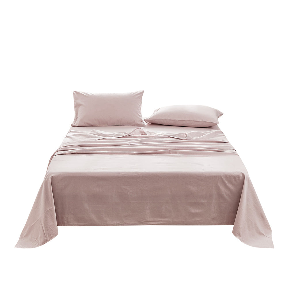 100% washed cotton sheet set in purple, featuring a flat sheet, fitted sheet, and two pillowcases, showcasing a soft and breathable texture.