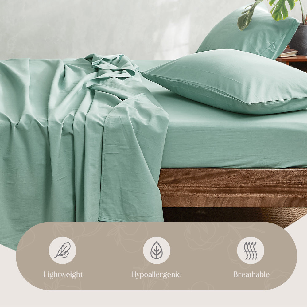 100% washed cotton sheet set in single green, featuring a soft texture and lightweight design, perfect for year-round comfort.