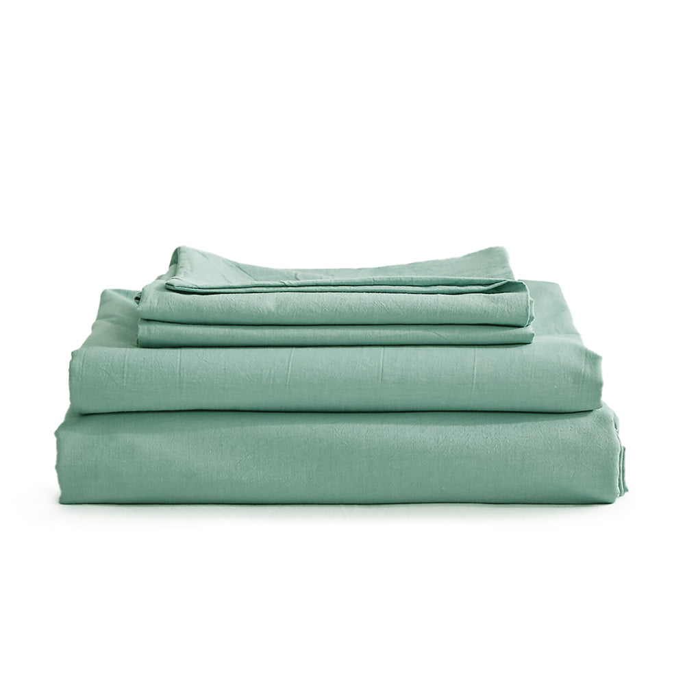 100% washed cotton sheet set in single green, featuring a soft texture and lightweight design, perfect for year-round comfort.