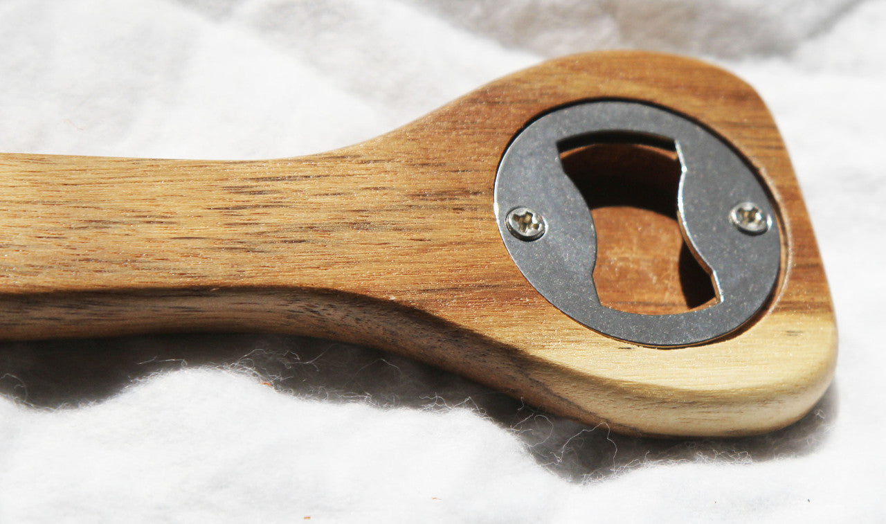 A set of 10 wooden spoon bottle openers with leather hang straps, showcasing their natural wood finish and practical design.