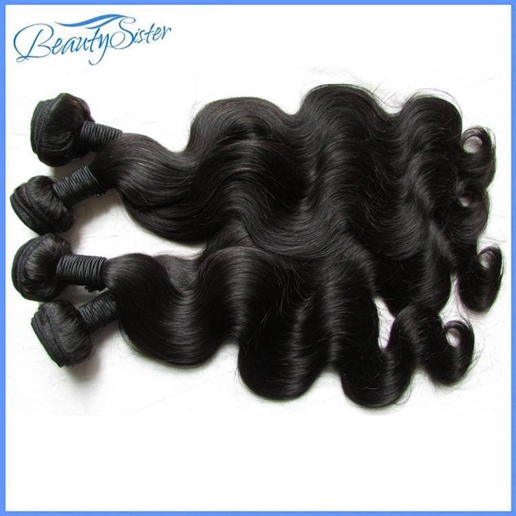 Four bundles of 10A Brazilian Virgin Hair in body wave texture, showcasing natural color and high quality.