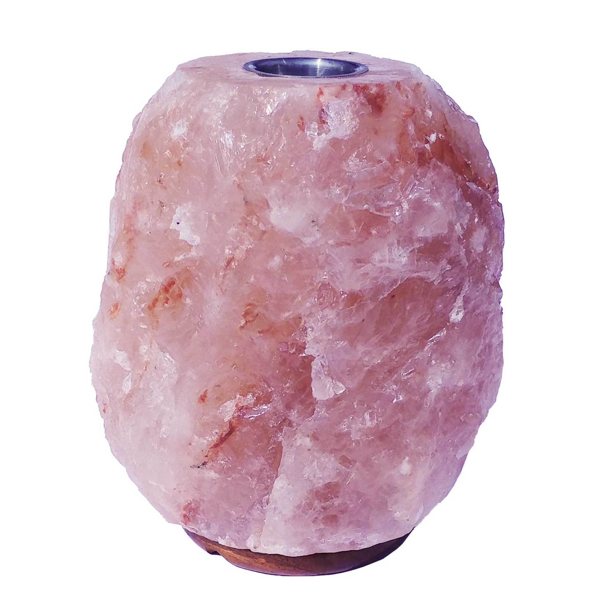 A beautifully handcrafted Himalayan pink salt diffuser lamp with a warm glow, showcasing its natural rock texture and wooden base.